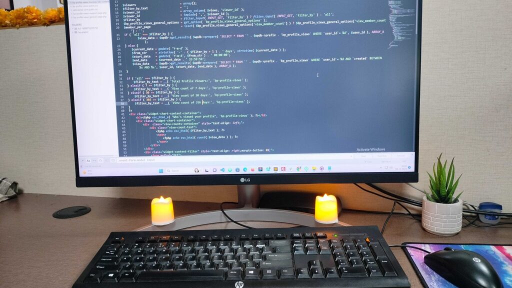 Desktop monitor displaying web development code in a clean workspace.